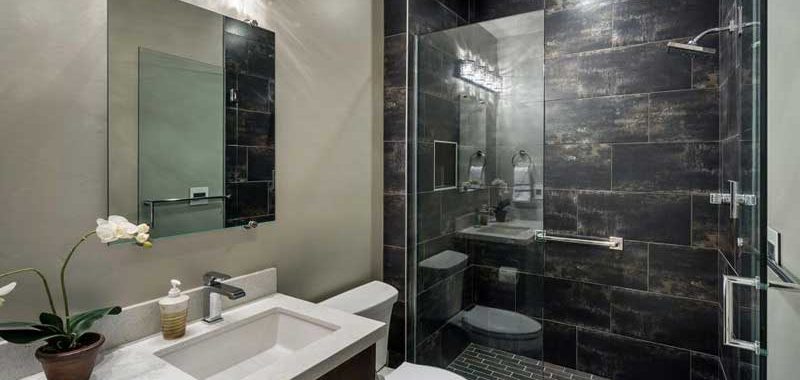 Contemporary Bathroom with Dark Tile