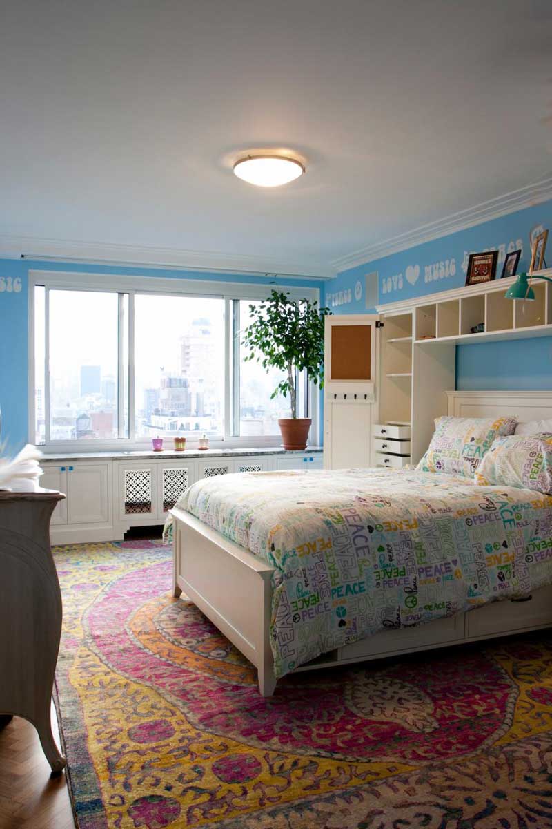 Teenage Girl Bedroom With Pink and Yellow Rug