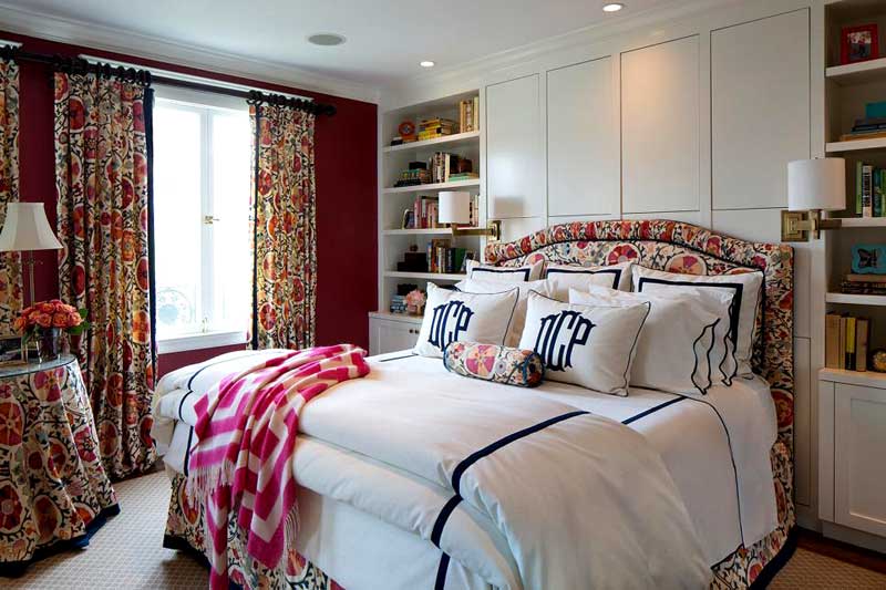 Bold Red Bedroom With Floral Curtains