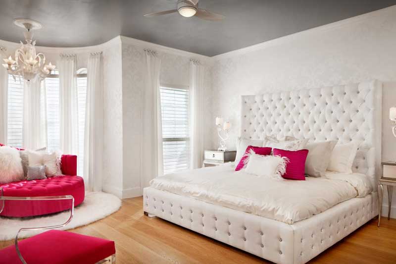 Glam Bedroom With White Tufted Bed