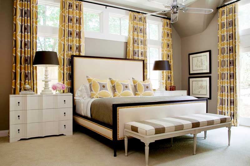 Gray and White Bedroom With Yellow Curtains
