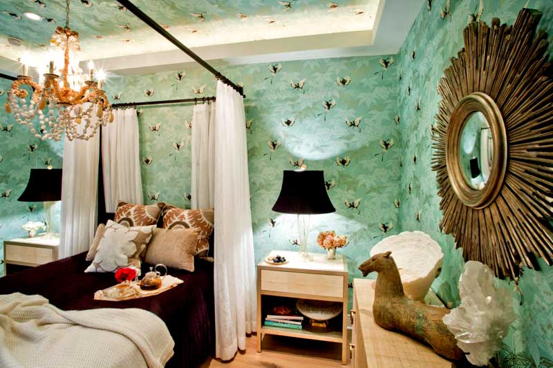 Green Bedroom With Printed Wallpaper