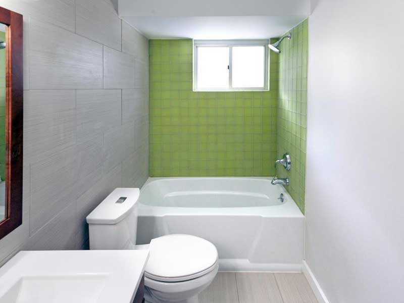 Bathroom with Green Tile Backsplash