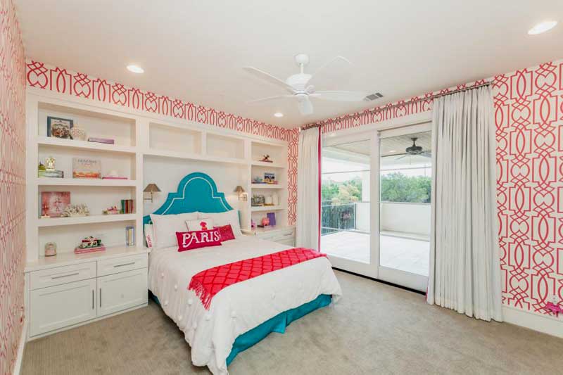 Pink and White Teenage Girl Bedroom With Blue Bed