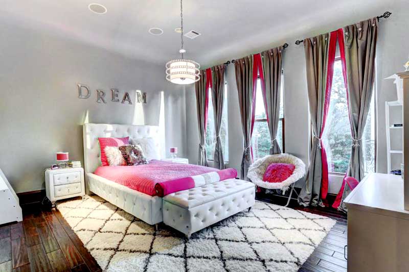 Pink and White Teenage Girl Bedroom With Tufted Bed