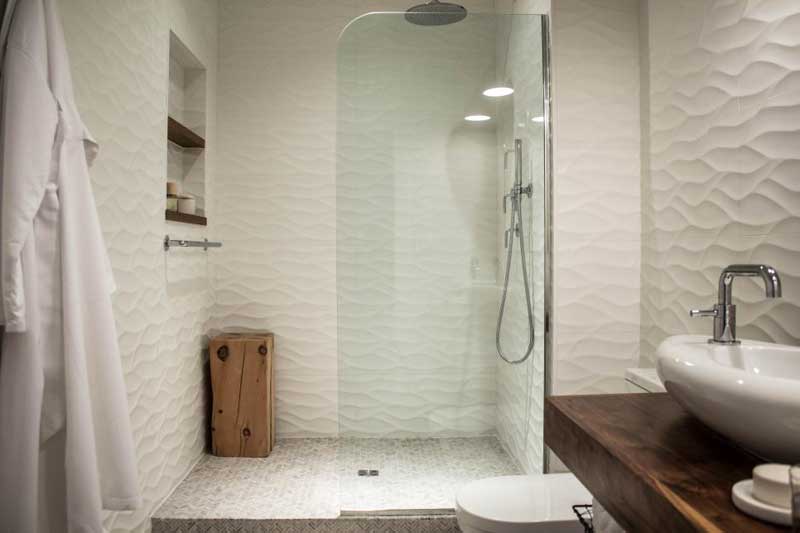 Bathroom with Rippled Tile Wall