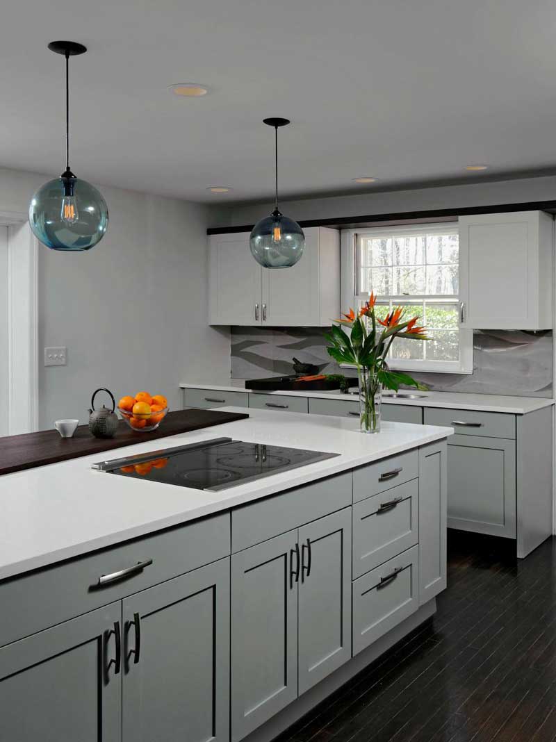 White Kitchen Island with Globe Lighting