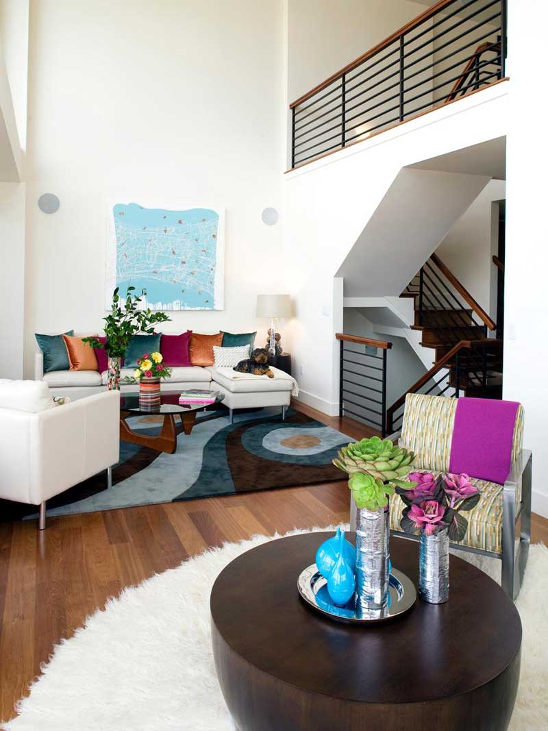 White Living Room With Vibrant Throw Pillows