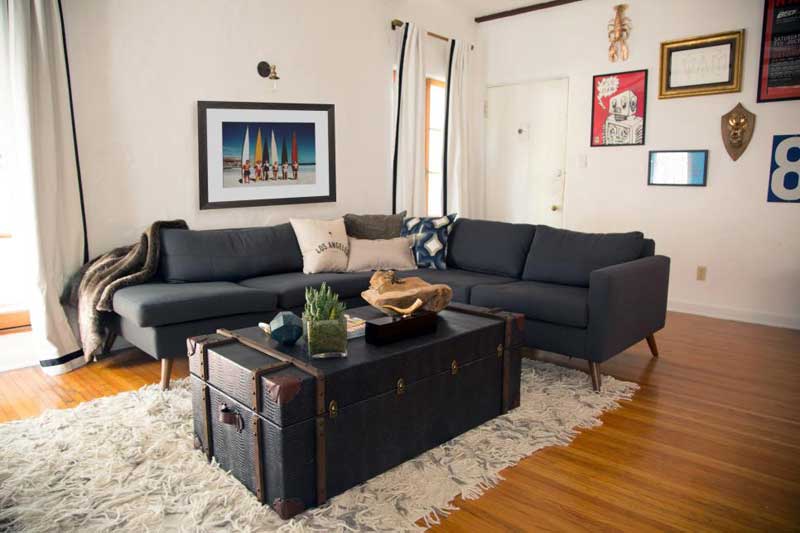 White Living Room with Black Sofa