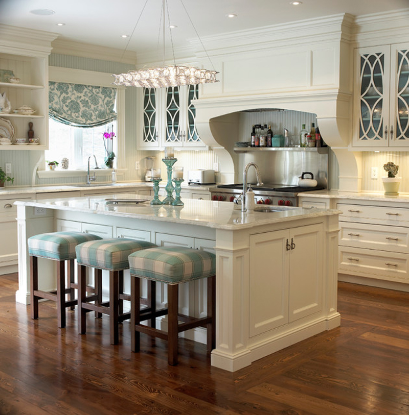 White kitchen with shabby chic bar stools. Kitchen with box pendant lights over kitchen island with marble countertops