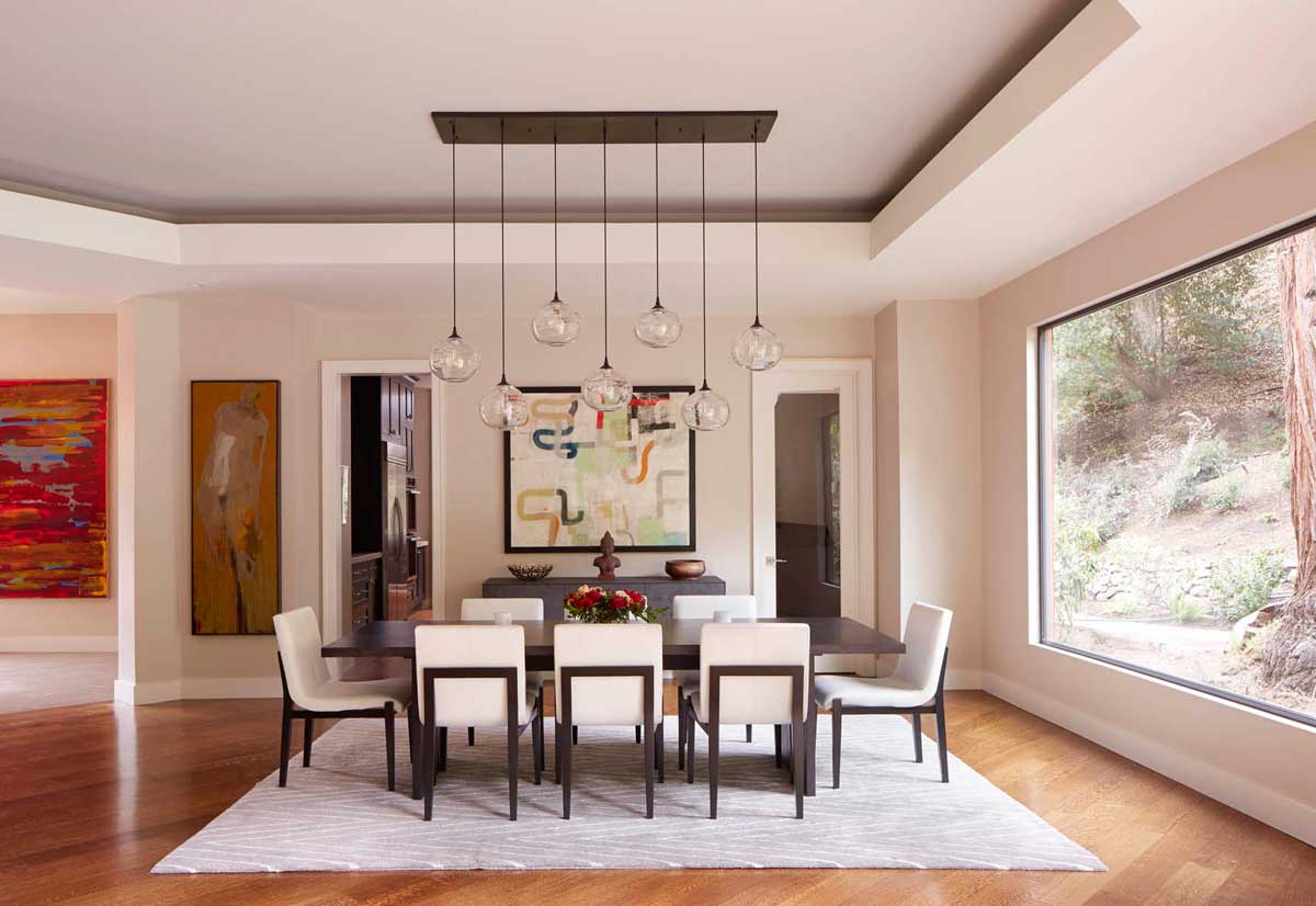 dining room with glass pendant light 