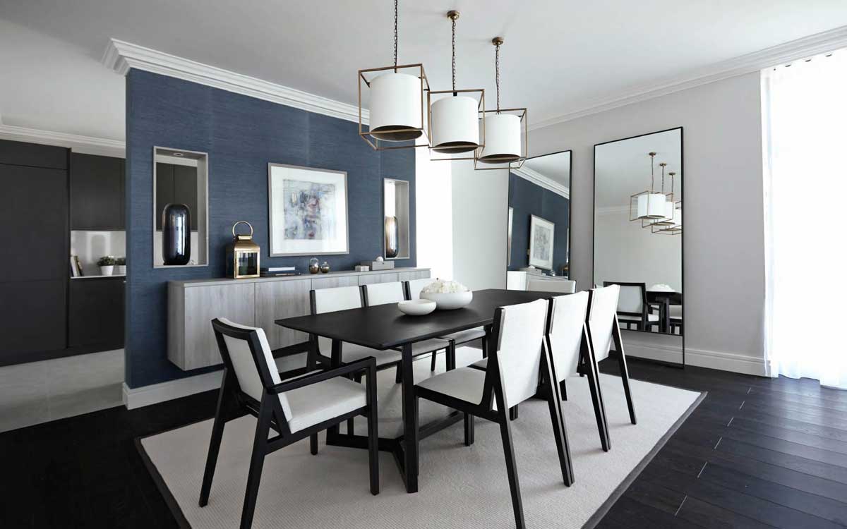dining room with white drum pendant lights