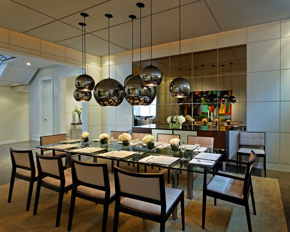 modern dining room with chrome glass globe pendant lights