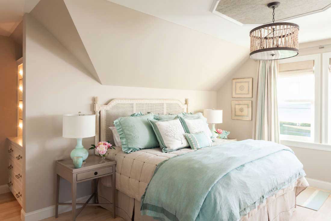 small bedroom with drum shade pendant light