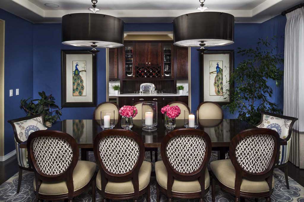 traditional navy blue dining room with black drum pendant light fixtures