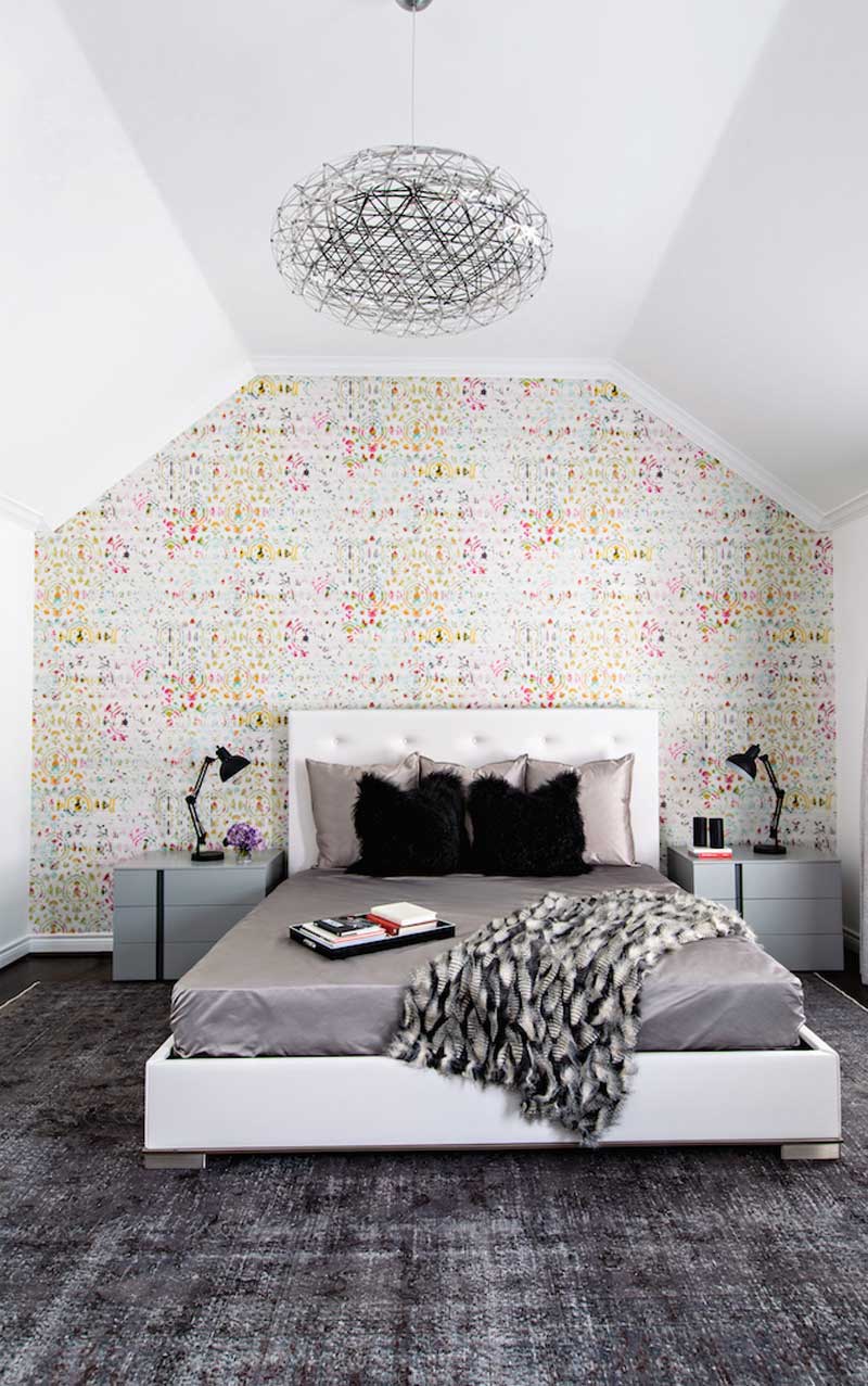 modern bedroom with orb chandelier 