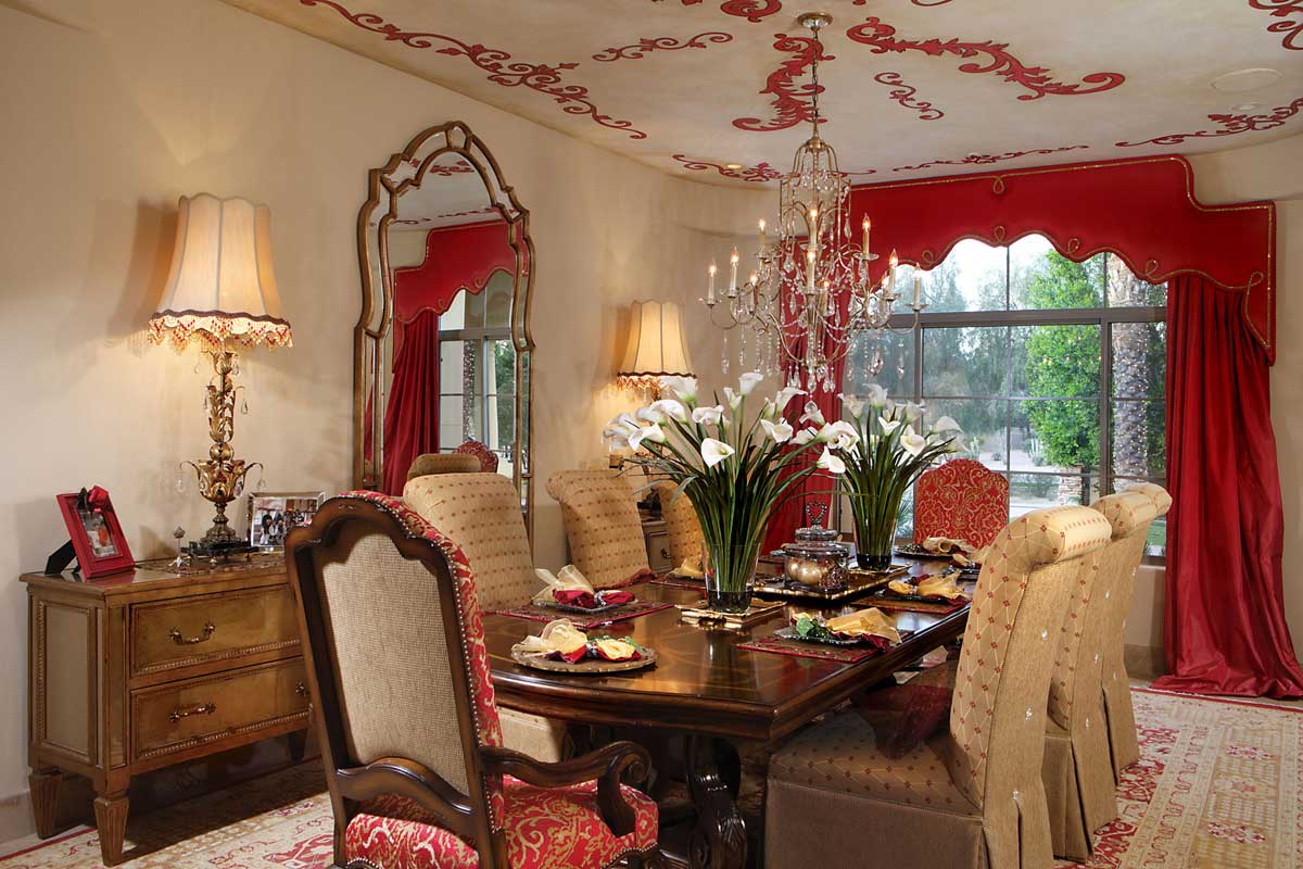 formal dining room with table lamps and crystal candle chandelier