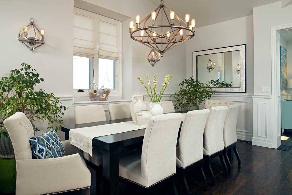 transitional dining room with industrial glass chandelier