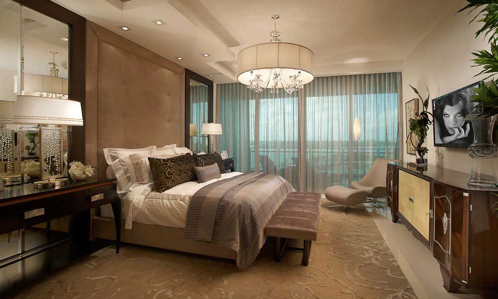 master bedroom with drum shade chandeliers 