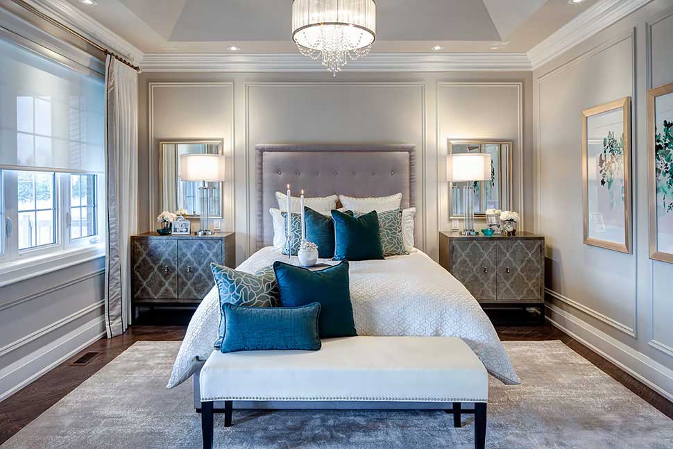 small master bedroom with drum crystal chandelier 