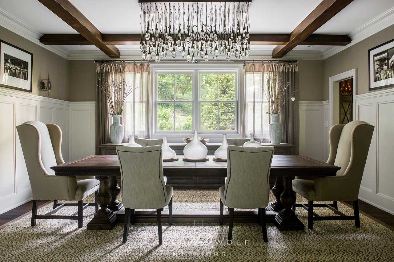 beige dining room with pendant lighting