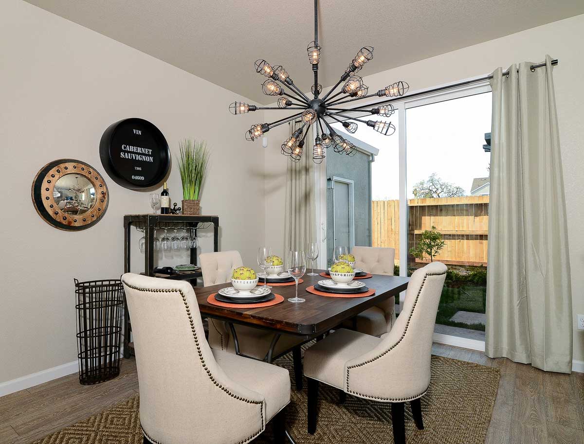 small dining room with sputnik style chandeliers