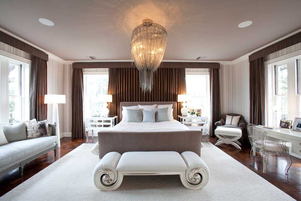 master bedroom with mother chandelier