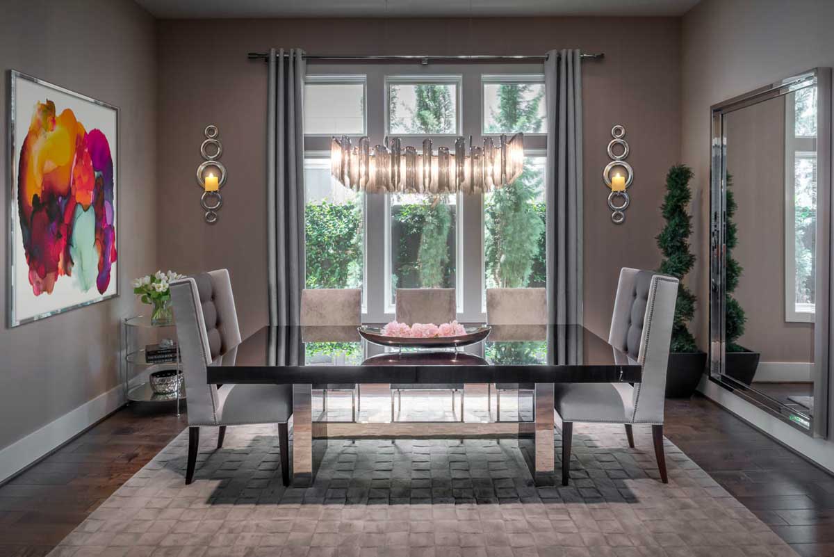 gray dining room with linear crystal chandelier