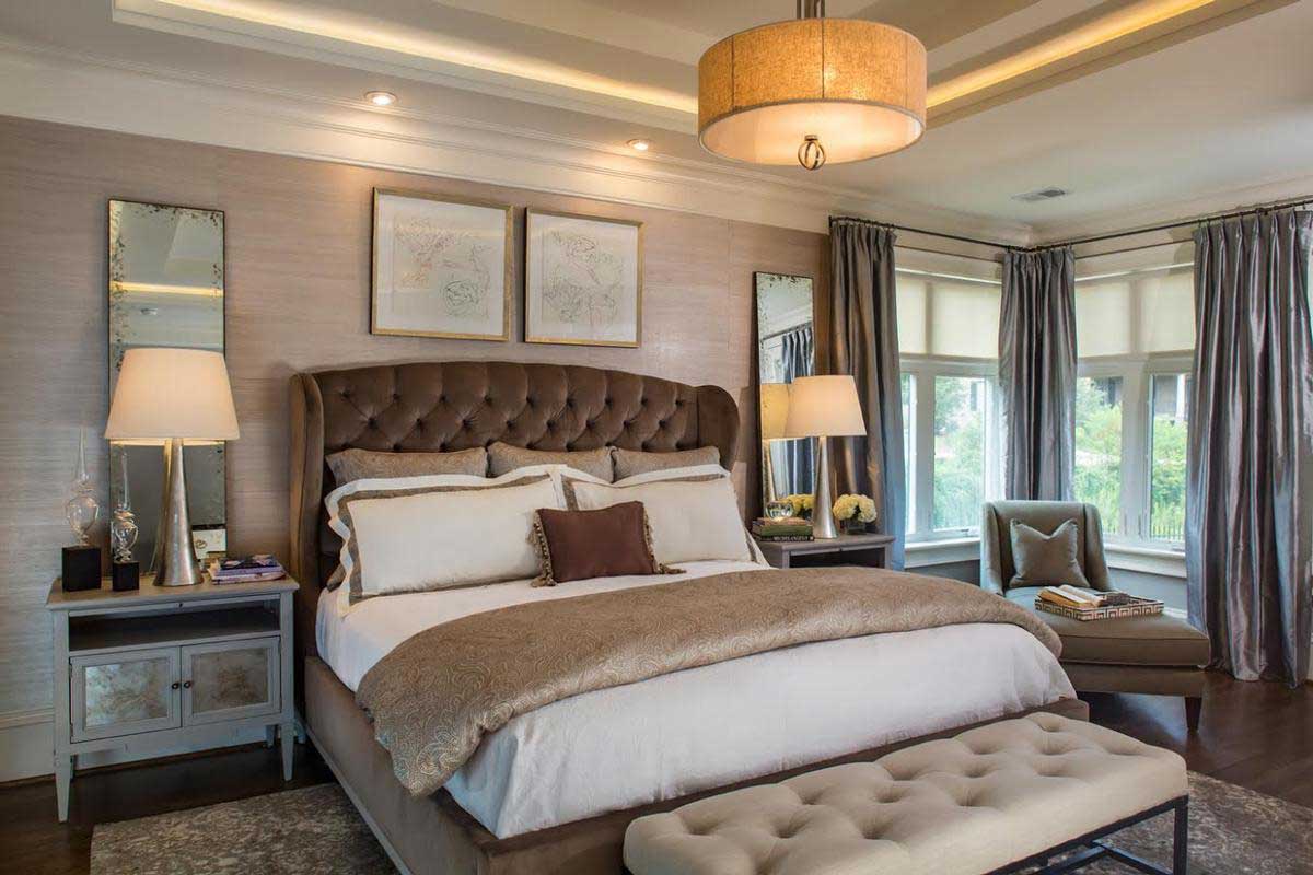 master bedroom with table lamps and drum shade pendant lighting