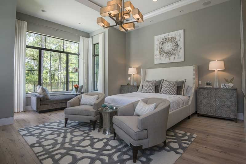 master bedroom with square cage chandeliers