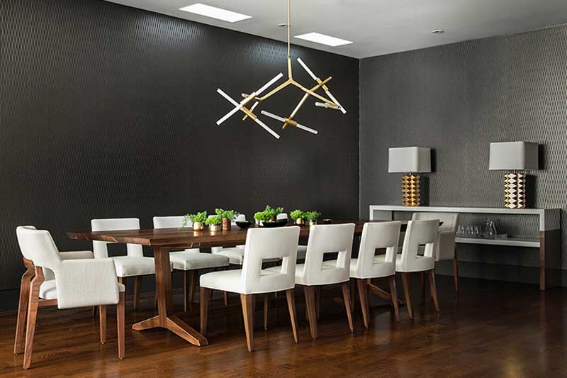 gray and white dining room with branch pendant light