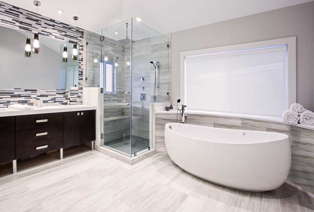 bathroom with glass tube pendant light