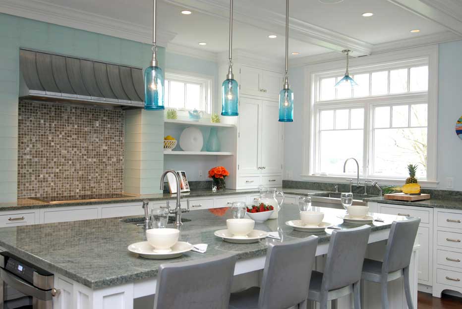 kitchen with turquoise glass pendant light