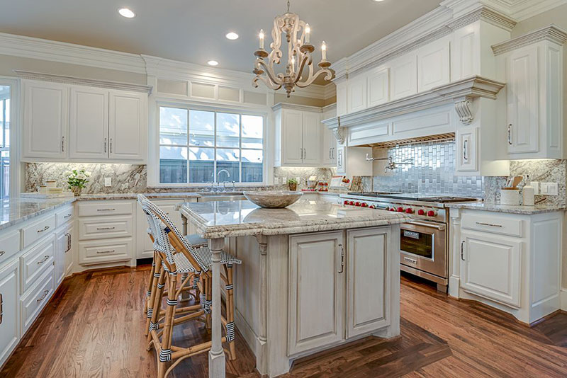 Traditional kitchen with aspen white granite countertops