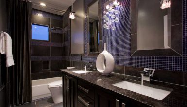 small bathroom with wall sconce chandelier