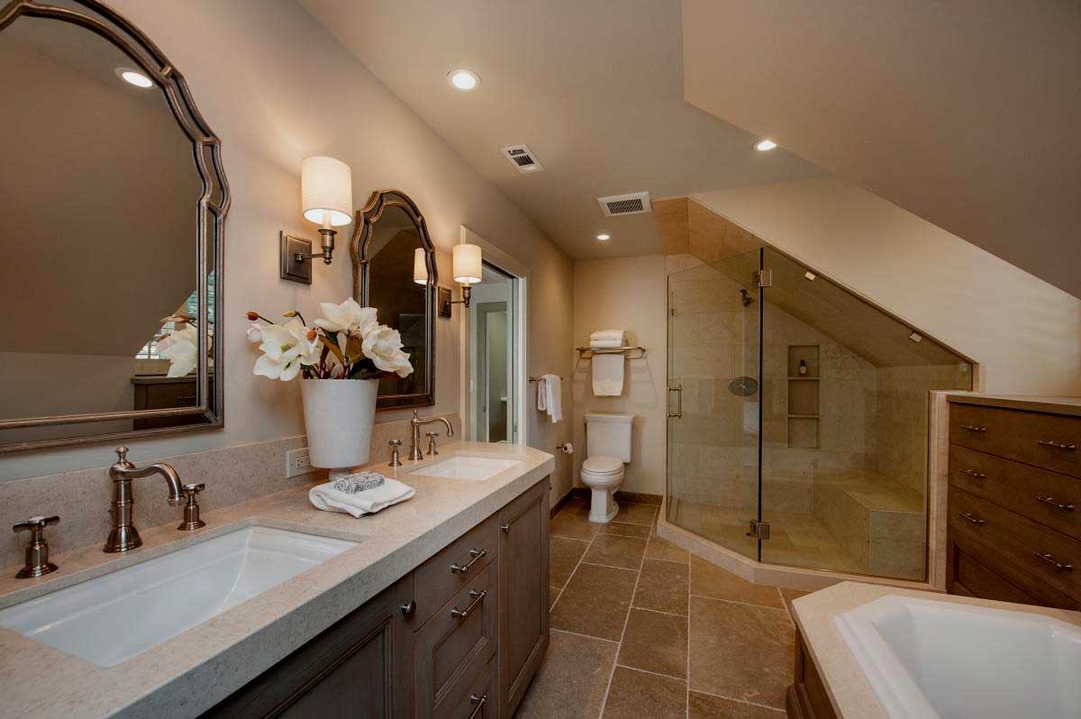bathroom with large wall sconces