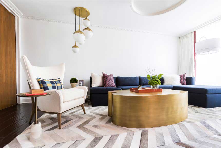 living room with white gold pendant lights