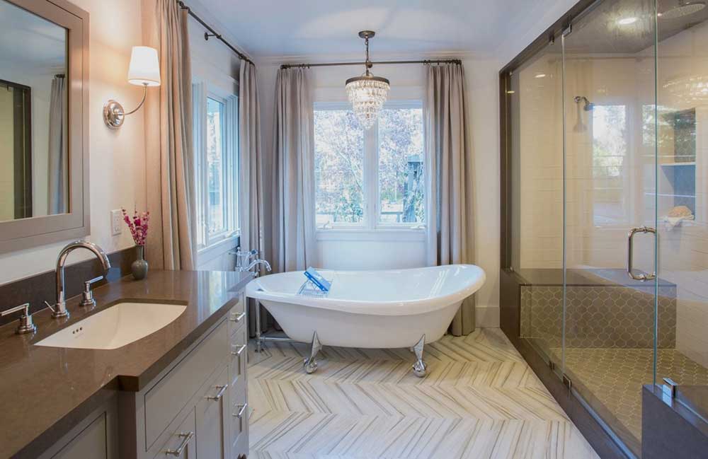bathroom with crystal chandelier 