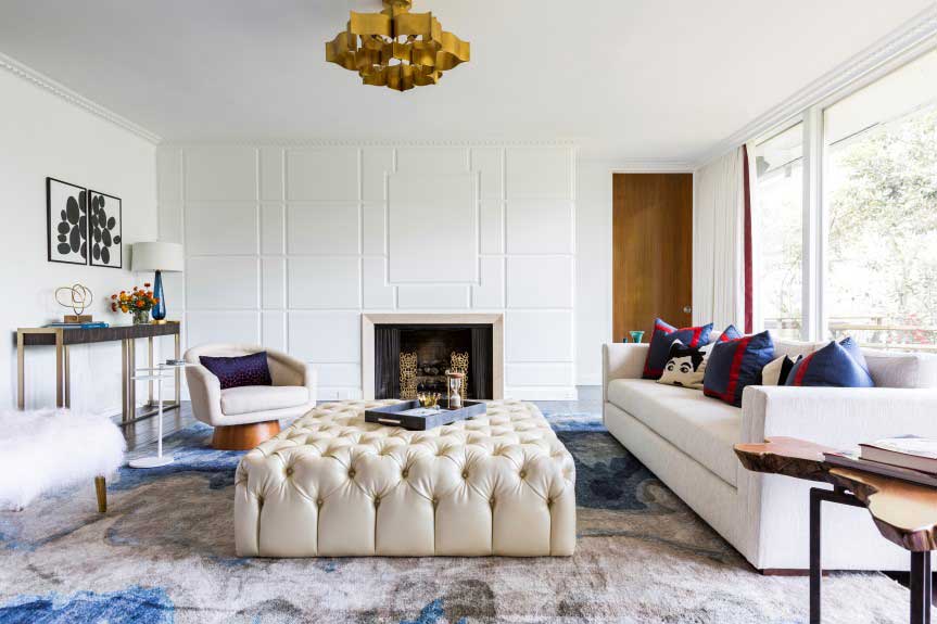 living room with gold pendant ceiling light