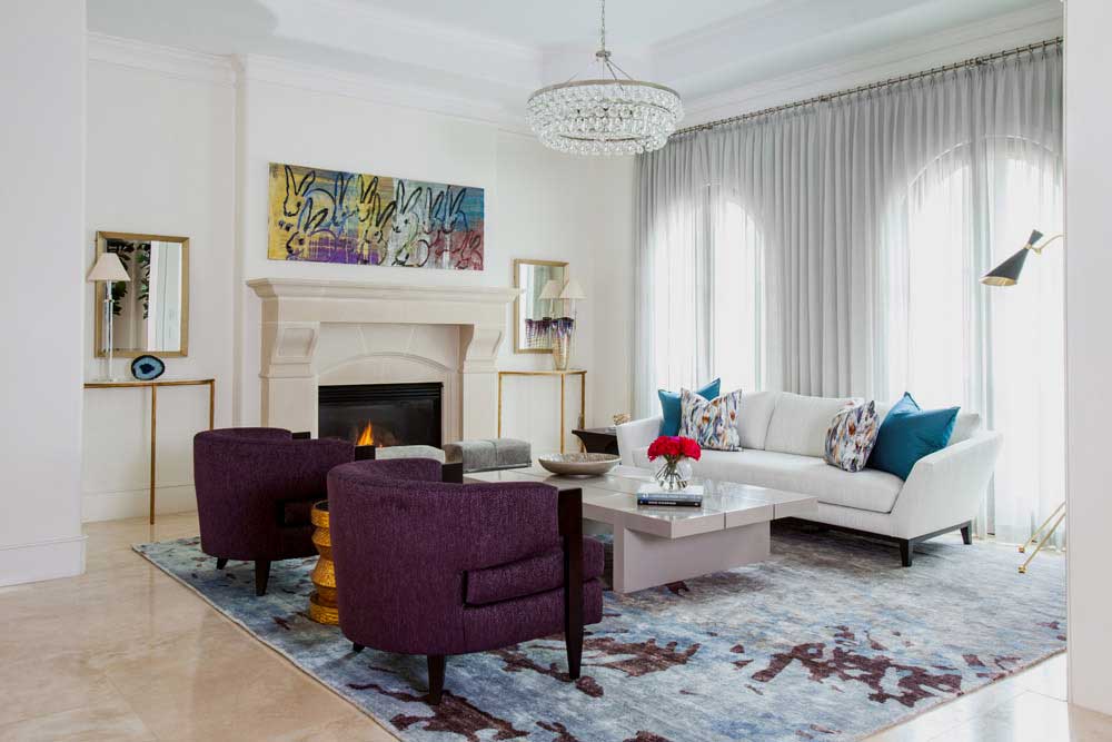 living room with modern crystal pendant lamp