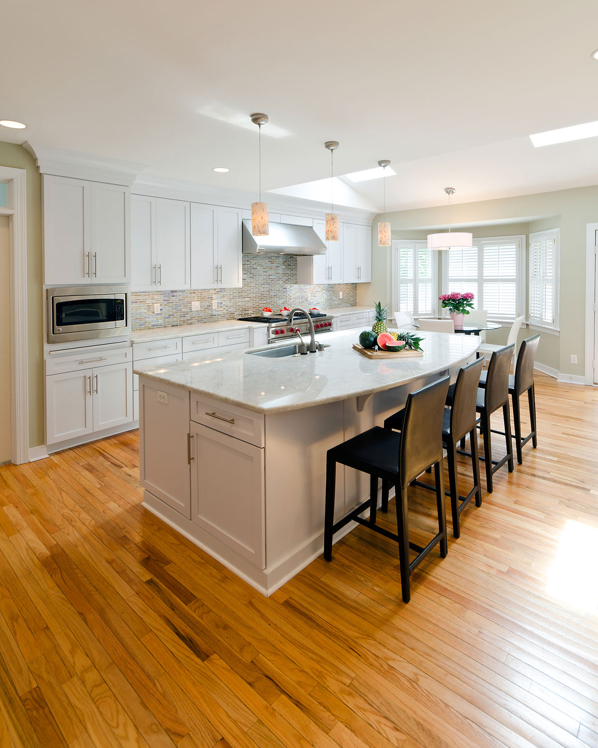 Contemporary kitchen with white pearl granite countertops