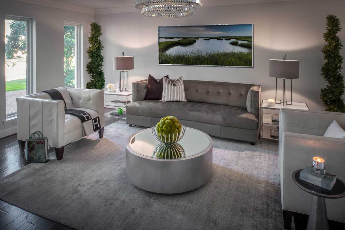 living room with glass drop crystal chandelier