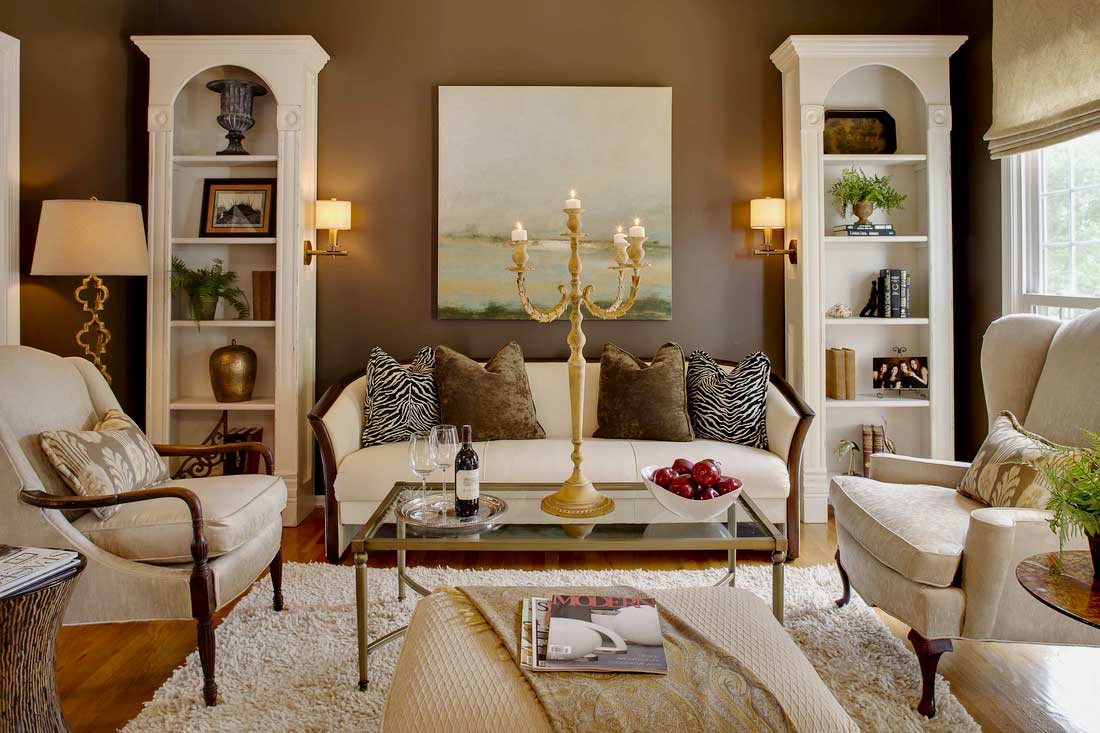 living room with candle table lamp and wall sconces