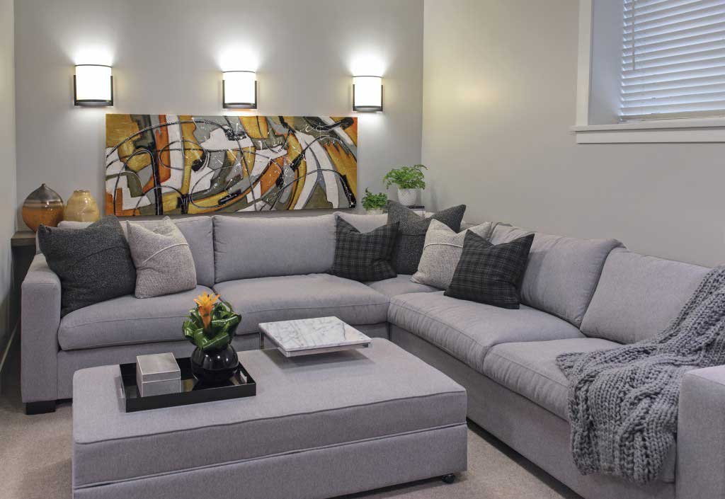 gray living room with wall sconces lighting fixtures