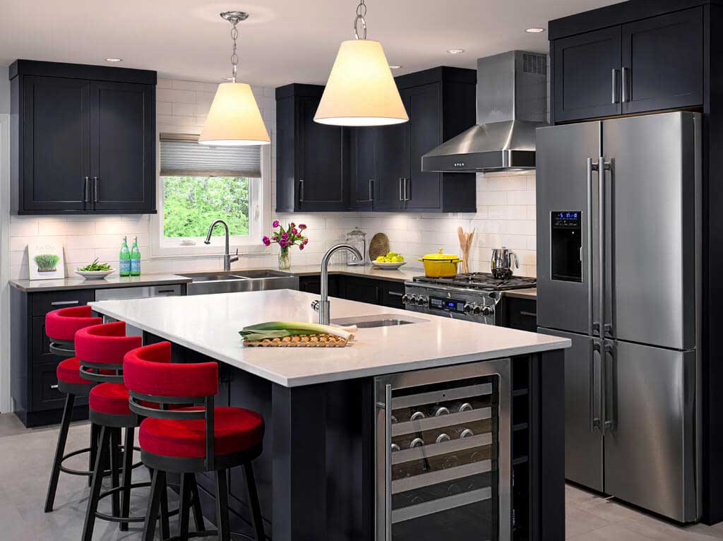 black kitchen with white dome pendant lights