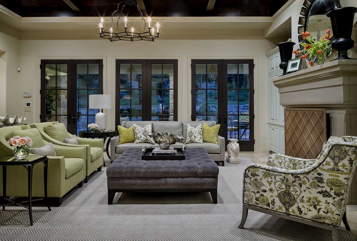 living room with iron candle chandelier