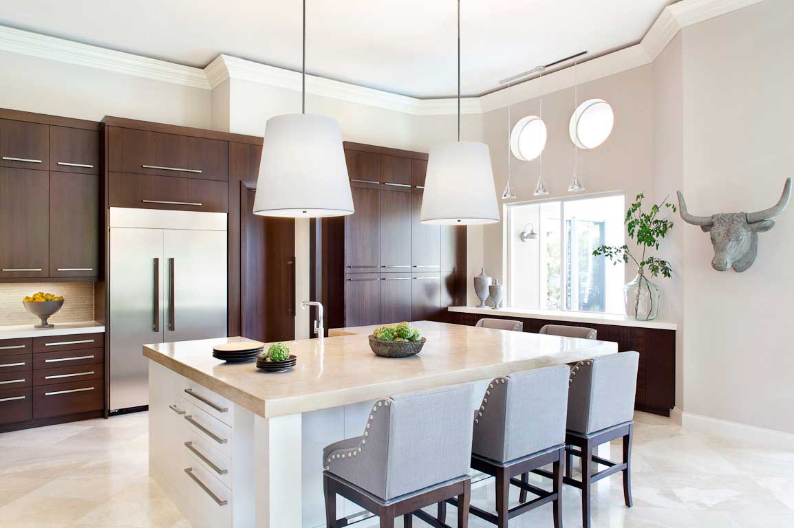 kitchen with large white pendant lights 