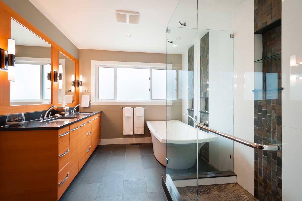 contemporary orange bathroom with and wall sconces