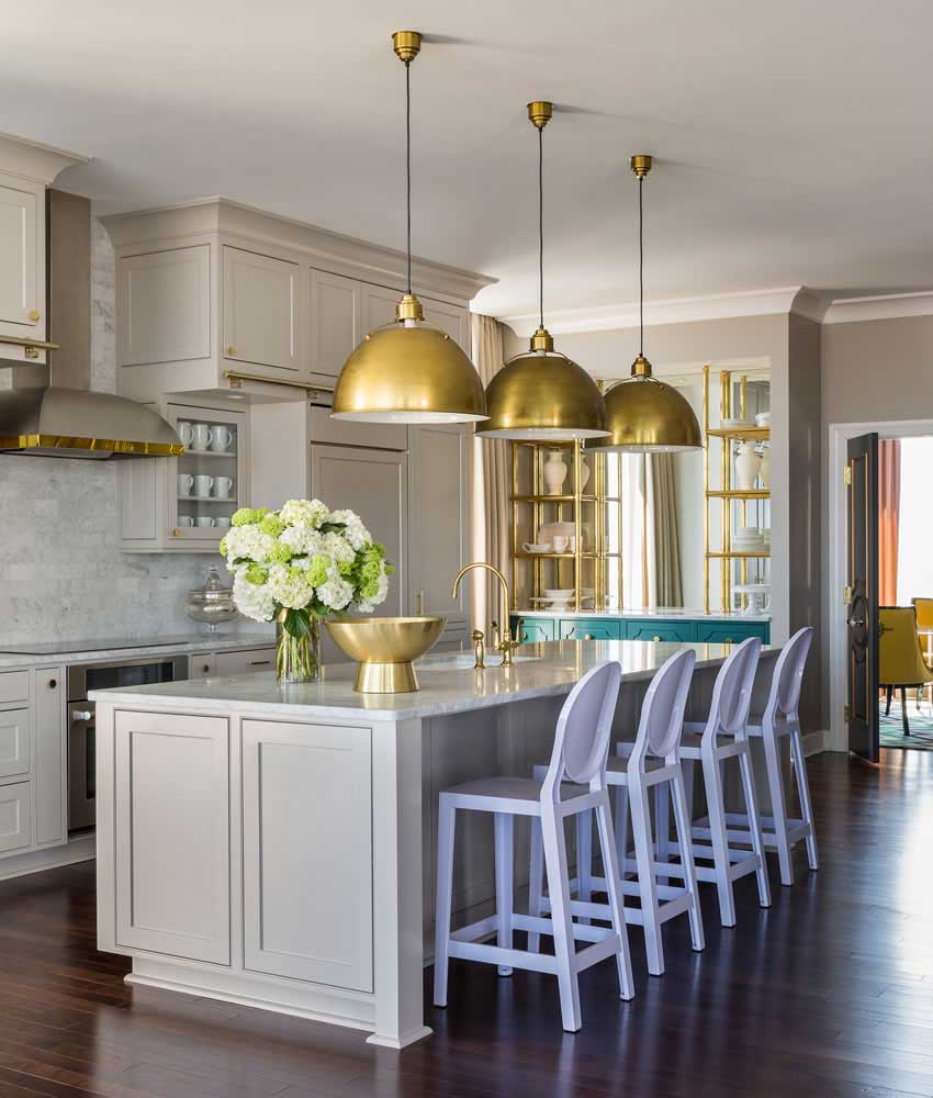 kitchen with gold dome pendant lights 