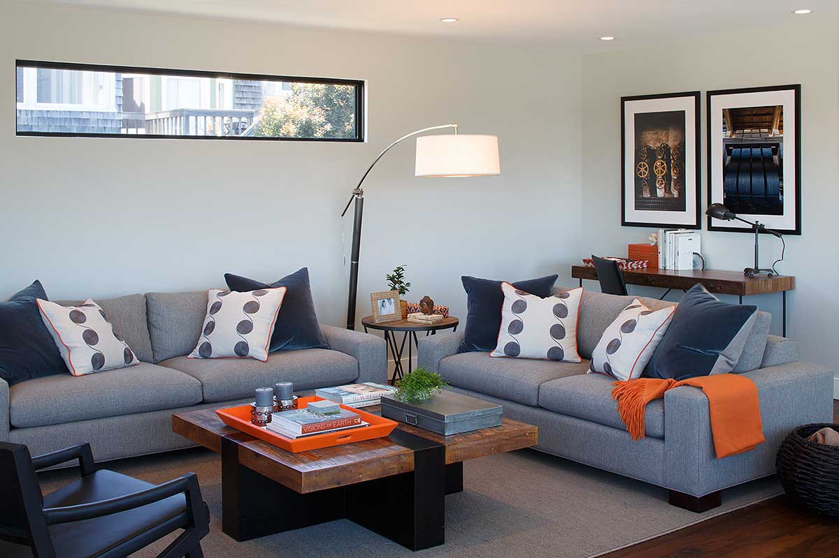 living room with drum shade arc floor lamp